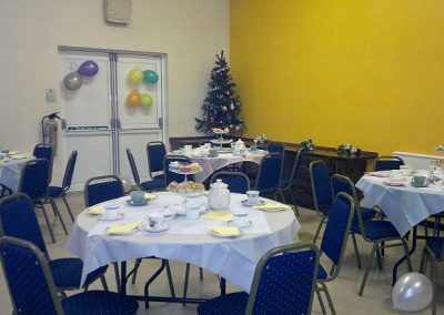 Community Centre function room with tables set